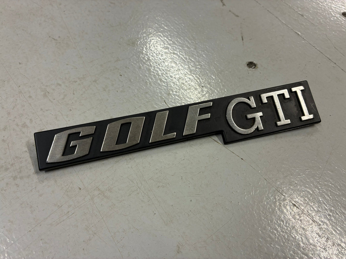 VW Mk1 Golf GTi Merking | Genuine Volkswagen Mk1 Golf GTI rear tailgate logo.